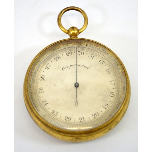 74 - A gilt brass military issue pocket barometer, compensated, B1246, crows foot mark, 7cm diameter