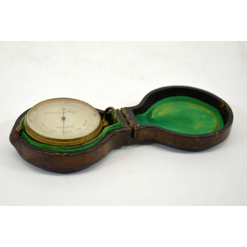 75 - A Victorian brass pocket barometer, in velvet lined leather case, Macgill, Edinburgh, 4.5cm diameter