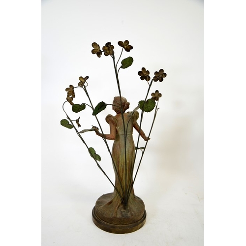 82 - A pair of French Art Nouveau bronzed and painted figures, La Violette and L'Orchidee, modelled as fe... 