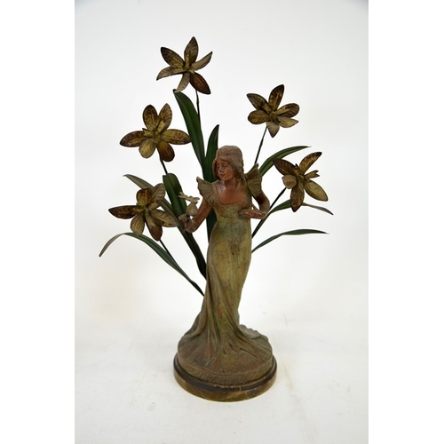 82 - A pair of French Art Nouveau bronzed and painted figures, La Violette and L'Orchidee, modelled as fe... 