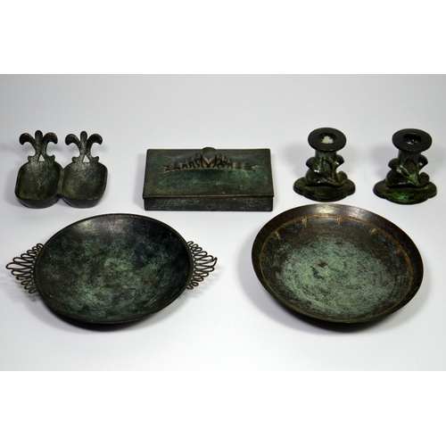 86 - Six pieces of Palestinian bronze including two bowls, a pair of candlesticks, a box and a double dis... 