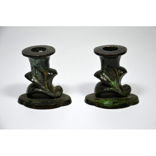 86 - Six pieces of Palestinian bronze including two bowls, a pair of candlesticks, a box and a double dis... 