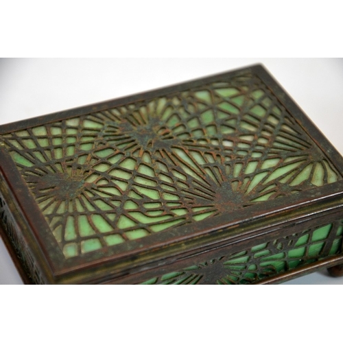 87 - Tiffany Studios, a bronze and glass box, number 800, together with an inkwell, the casket with Pine ... 