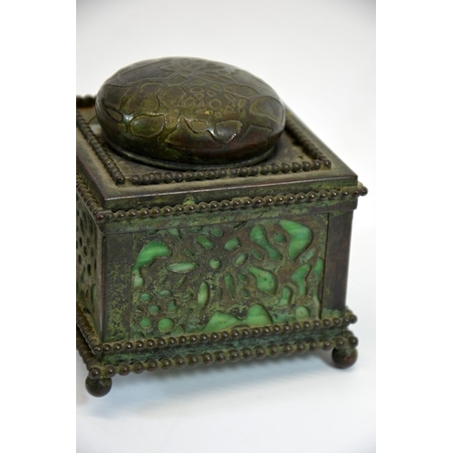 87 - Tiffany Studios, a bronze and glass box, number 800, together with an inkwell, the casket with Pine ... 