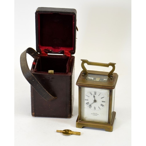 95 - A Mappin and Webb gilt brass carriage timepiece, in leather case, with key, 14.5cm high to handle