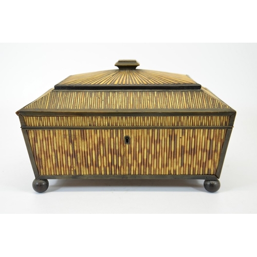 105 - A 19th century porcupine quill and horn work box, circa 1820, sarcophagus form on ball feet, sandal ... 