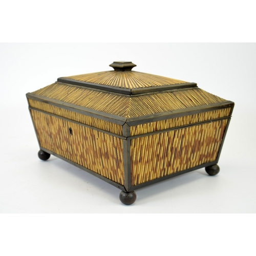 105 - A 19th century porcupine quill and horn work box, circa 1820, sarcophagus form on ball feet, sandal ... 