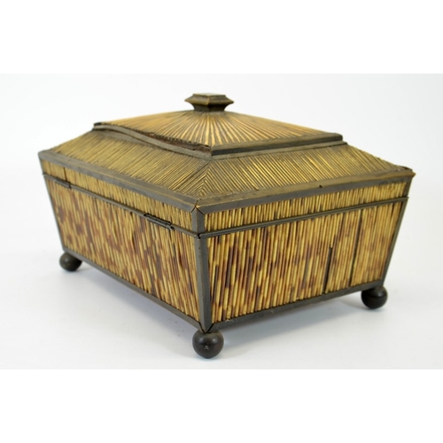 105 - A 19th century porcupine quill and horn work box, circa 1820, sarcophagus form on ball feet, sandal ... 