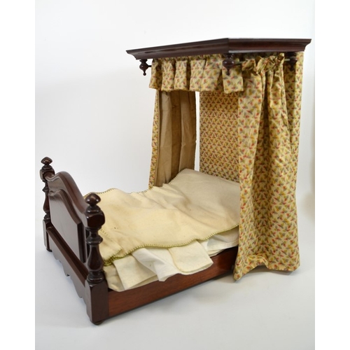 107 - A Victorian mahogany dolls half tester bed, with fabric upholstery, 41cm high