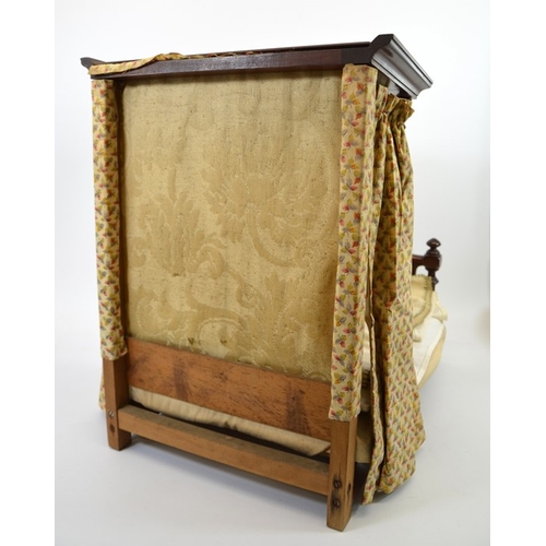 107 - A Victorian mahogany dolls half tester bed, with fabric upholstery, 41cm high