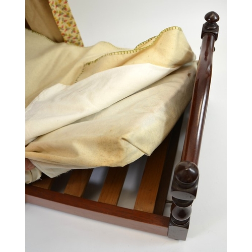 107 - A Victorian mahogany dolls half tester bed, with fabric upholstery, 41cm high