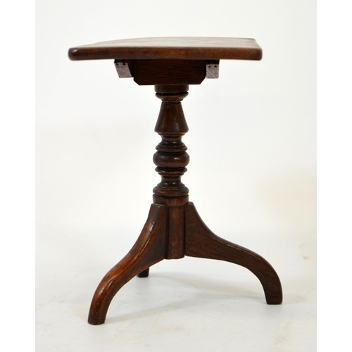 109 - A miniature Victorian mahogany veneered tilt top pedestal table, rectangular top, on tripod base, 18... 