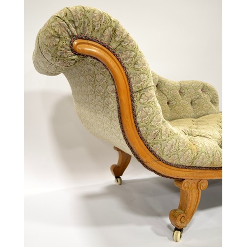 119 - A Biedermeier satinwood chaise longue, circa 1840, S shaped design on cornucopia horn feet and brass... 