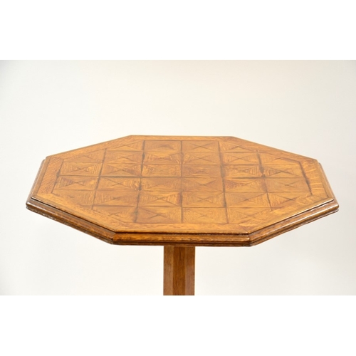 127 - A Gothic Revival oak occasional table, in the style of A W N Pugin, inlaid with a parquetry octagona... 