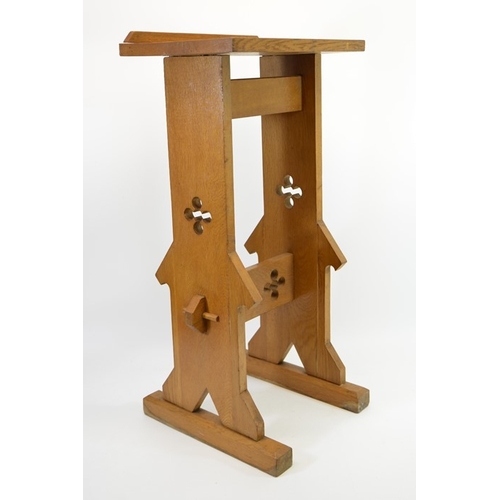 129 - A Gothic Revival oak book stand, in the Pugin style, pegged construction with pierced quatrefoil dec... 