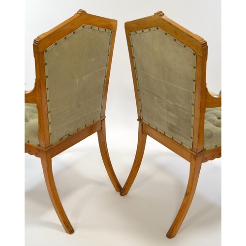 138 - Charles Bevan (attributed), a pair of Gothic Revival oak open armchairs, each chair inlaid with ebon... 