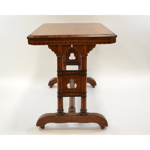 139 - Charles Bevan (attributed), a Reformed Gothic revival pine table, the figured rectangular top with d... 