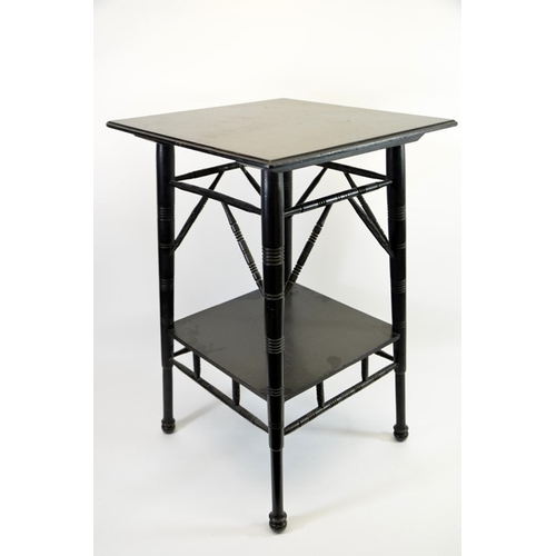 144 - An Aesthetic Movement ebonised occasional table, in the style of E W Godwin, circa 1880, two tiers w... 