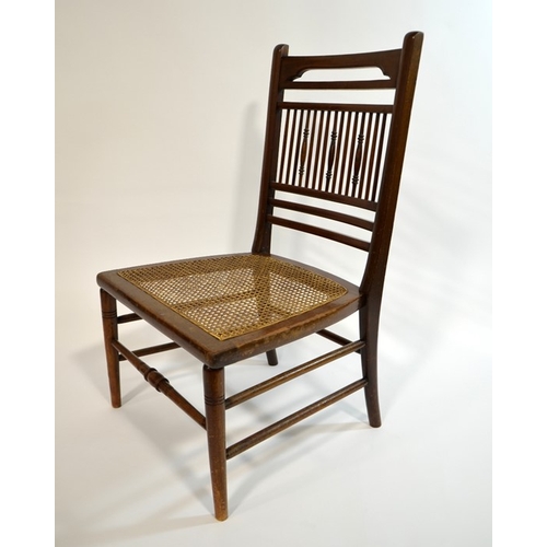 145 - E W Godwin for William A & S Smee, an Aesthetic Movement walnut chair, in the Anglo Japanese style, ... 