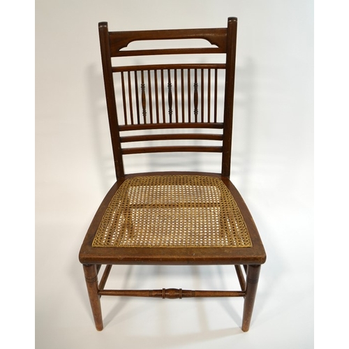 145 - E W Godwin for William A & S Smee, an Aesthetic Movement walnut chair, in the Anglo Japanese style, ... 