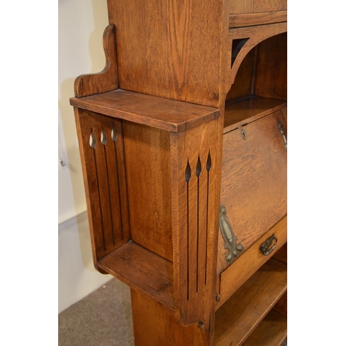 147 - A Glasgow School, Arts and Crafts oak bureau, in the style of Wylie and Lochhead, the fall front wit... 