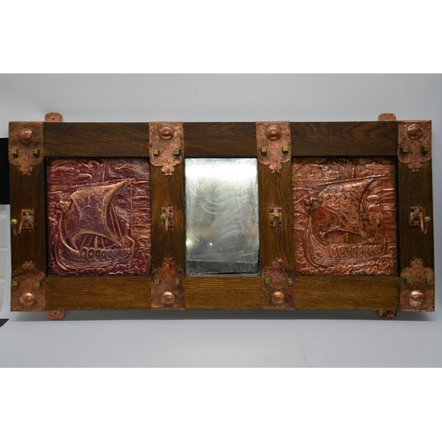 154 - An Arts and Crafts oak mirror wall mounted coat rack, two repoussé copper panels depicting Viking lo... 