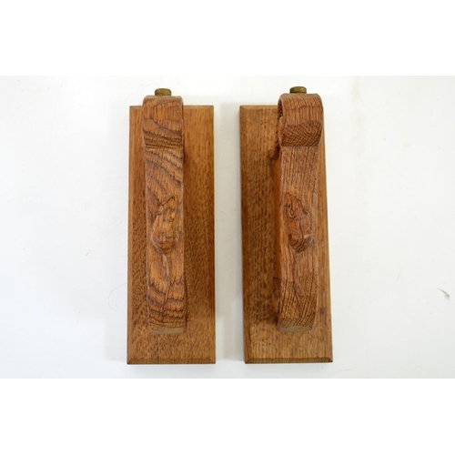 168 - Robert Thompson of Kilburn, pair of Mouseman oak twin wall lights, semi-circular design with carved ... 