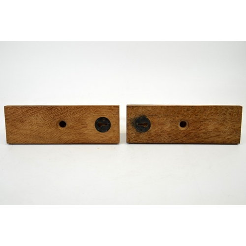 168 - Robert Thompson of Kilburn, pair of Mouseman oak twin wall lights, semi-circular design with carved ... 