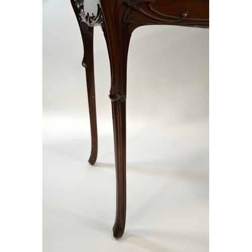 170 - Edward (Edouard) Colonna, an Art Nouveau walnut table, circa 1900, carved in relief with angular sin... 