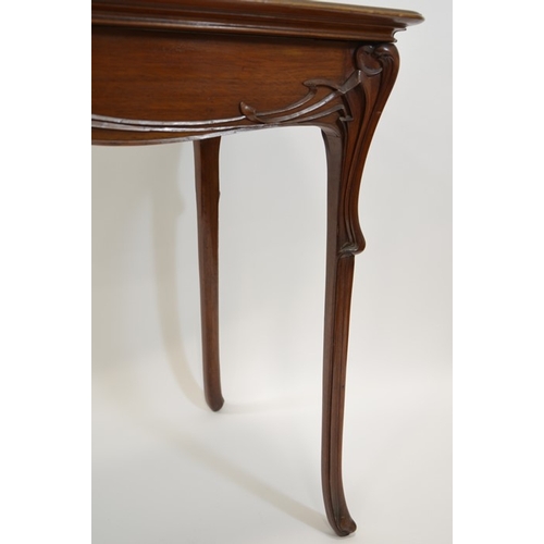 170 - Edward (Edouard) Colonna, an Art Nouveau walnut table, circa 1900, carved in relief with angular sin... 