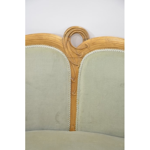 175 - Maurice Alet for La Ruche, an Art Nouveau walnut salon suite, circa 1900, carved with sinuous foliat... 