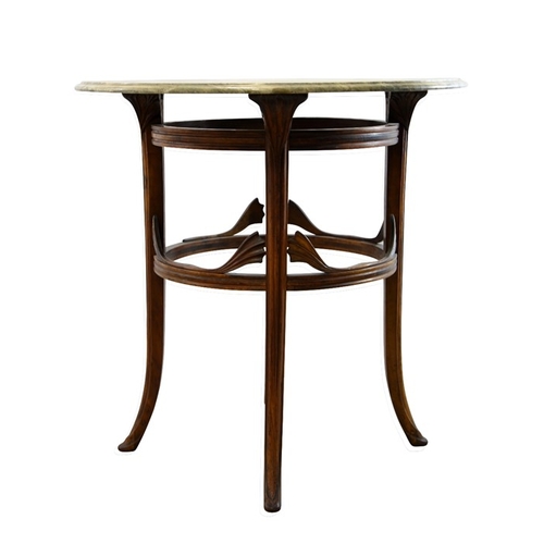 185 - An Art Nouveau mahogany and marble topped centre table, circa 1900, in the style of Louis Majorelle,... 