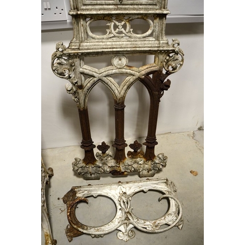 190 - A Victorian cast iron hall stand, circa 1860, open foliate design with central mirror cartouche, wit... 