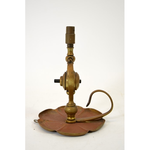 199 - W A S Benson, an Arts and Crafts copper and brass lamp, circa 1900, of wall hanging, chamberstick fo... 