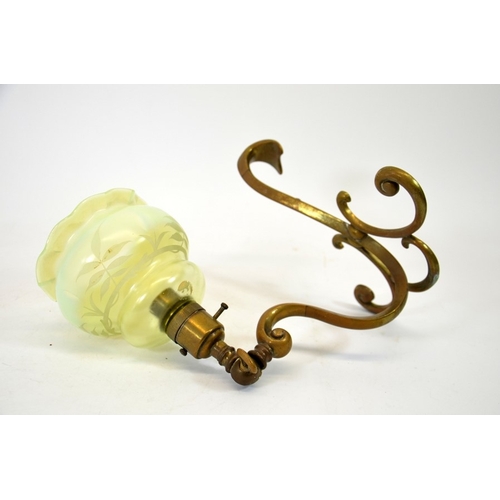 214 - An Arts and Crafts brass and glass light fitting, in the Benson style, cast scroll form with hook ba... 