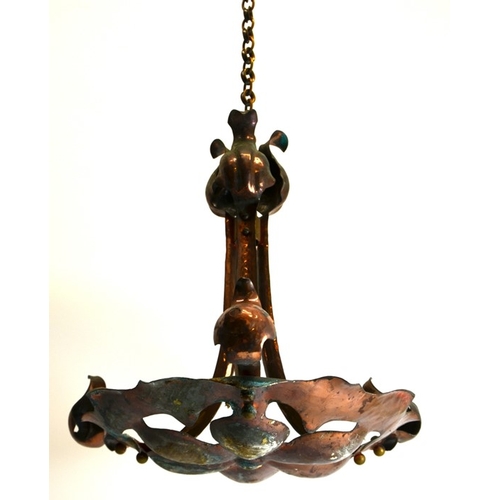 232 - An Arts and Crafts copper pendant light fitting, circa 1900, hammered naturalistic foliate form, the... 