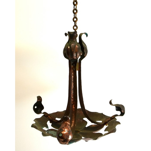 232 - An Arts and Crafts copper pendant light fitting, circa 1900, hammered naturalistic foliate form, the... 