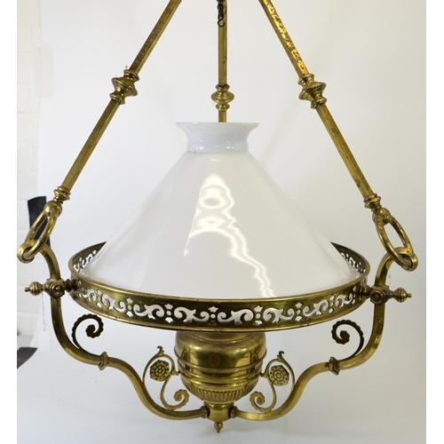 237 - A large Aesthetic Movement brass pendant light fitting, the reticulated ring supported on three squa... 