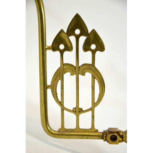 240 - An Arts and Crafts brass and opalescent glass wall light, the straw opal optic moulded shade, probab... 