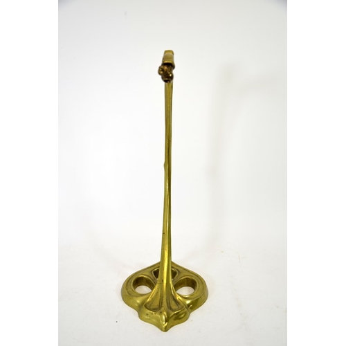 259 - An Art Nouveau gilt bronze table lamp, circa 1900, in the style of Louis Majorelle, open trefoil bas... 