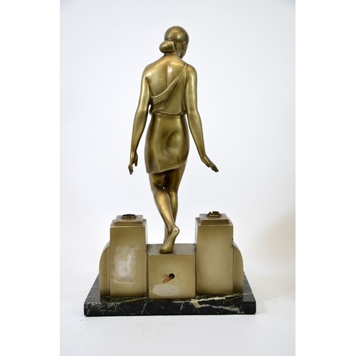 268 - Pierre le Faguays, an Art Deco bronze figural lamp, modelled as female bather descending into a pool... 