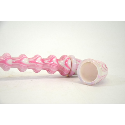 353 - A Nailsea glass pipe, pink and white opaque and opalescent glass, 45cm long