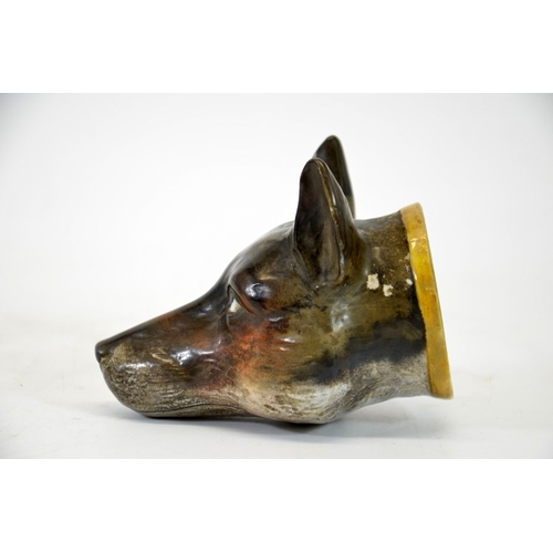 991 - A 19th century porcelain stirrup cup, modelled as a fox head, 12cm high