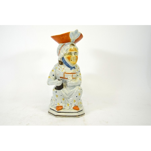 993 - A Prattware Toby Jug modelled as Martha Gunn, circa 1800, 28cm high