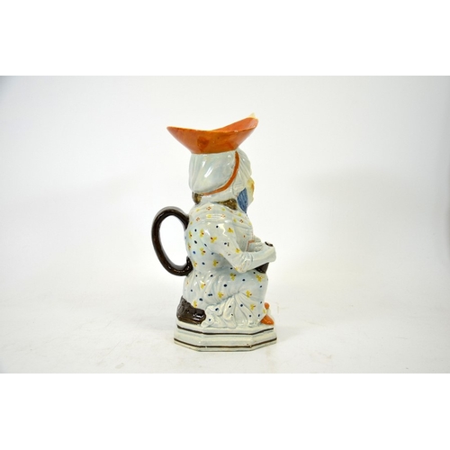 993 - A Prattware Toby Jug modelled as Martha Gunn, circa 1800, 28cm high