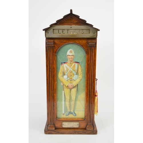 96 - A Victorian Country House oak letter box, in the form of a sentry box, the glazed door painted with ... 