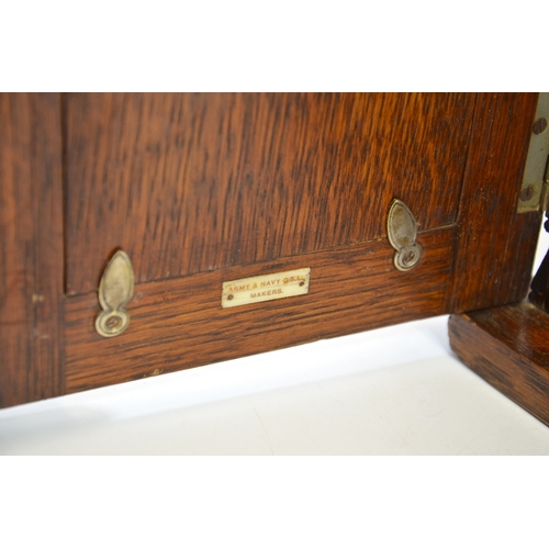 96 - A Victorian Country House oak letter box, in the form of a sentry box, the glazed door painted with ... 