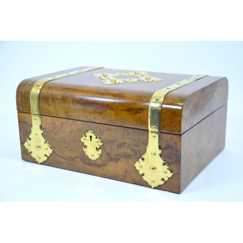 99 - A Victorian olive wood games compendium, circa 1875, brass banded with a matching ornate escutcheon,... 