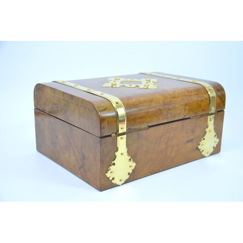 99 - A Victorian olive wood games compendium, circa 1875, brass banded with a matching ornate escutcheon,... 