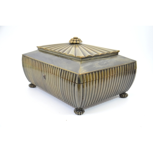 104 - An Anglo Indian, Vizagapatam, buffalo horn box, reeded bombe form with gadrooned finial, lined in sa... 